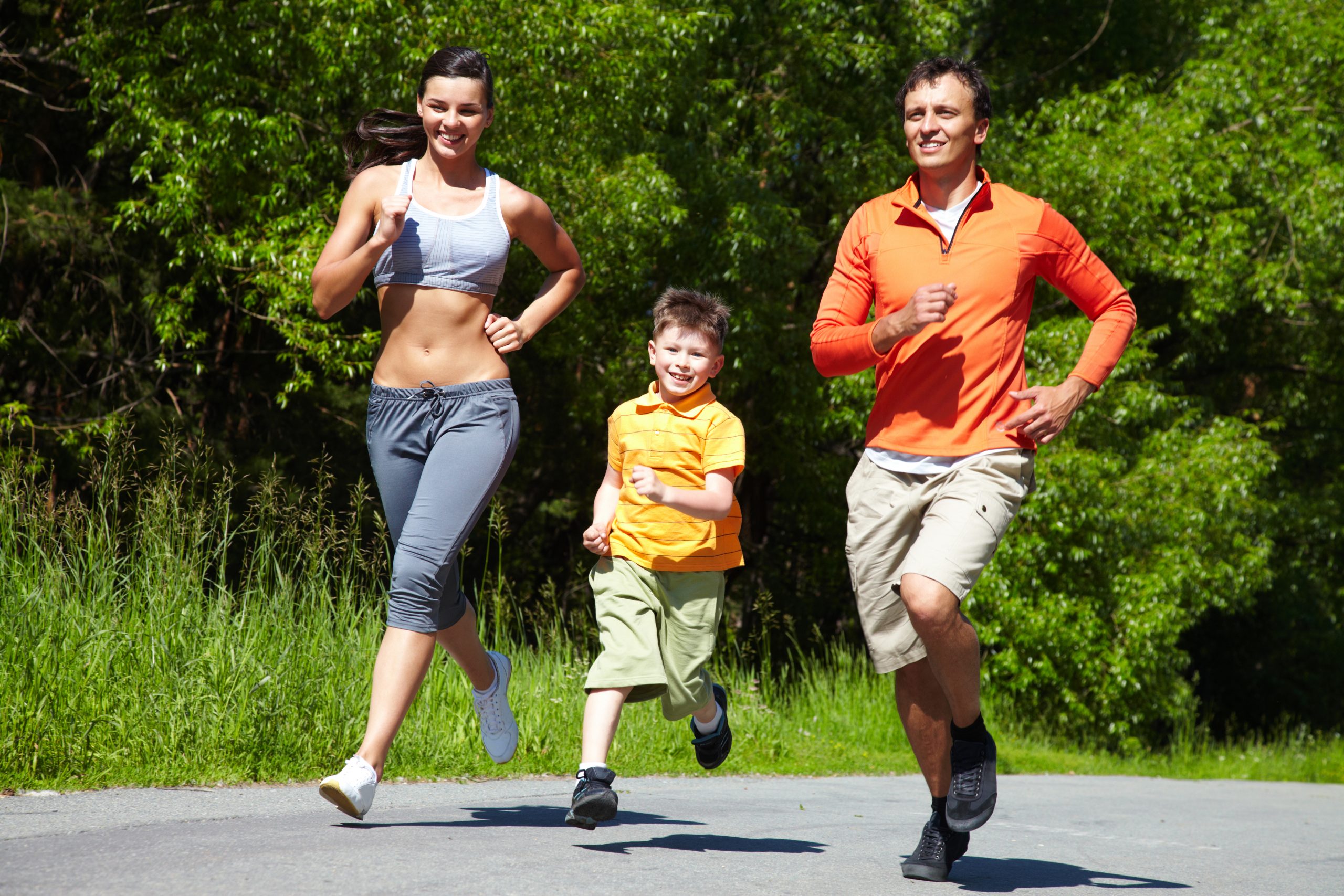 family running with child